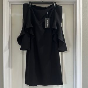 New with tag. Black off-shoulder dress with bell sleeves